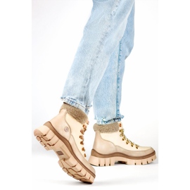 Botas de invierno de mujer con aislamiento beige y botas con cordones y pelo. 1