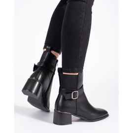 Botines negros de mujer con hebilla. 3