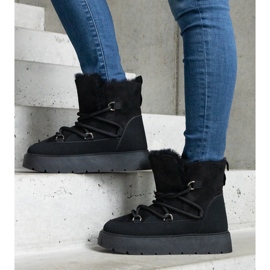 Botas de nieve de mujer con plataforma y forro de pelo en color negro 1