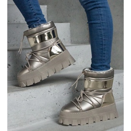 Botas de nieve con plataforma dorada y aplicaciones de charol dorado 1 Botas de nieve con plataforma dorada y aplicaciones de charol dorado 1