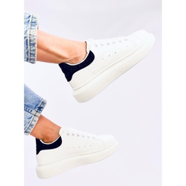Zapatillas con plataforma en blanco y negro. 4