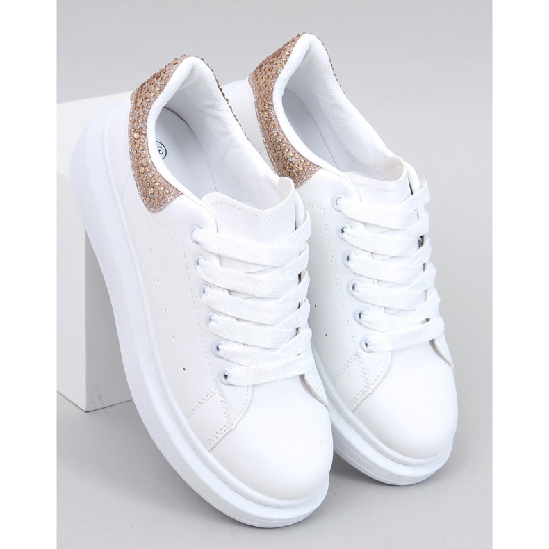 Zapatillas con plataforma blancas y doradas. blanco 1