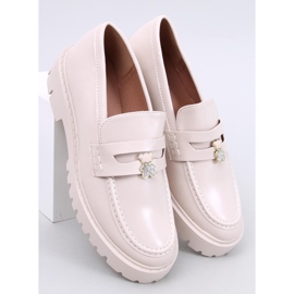 Mocasín plataforma beige con adorno 5