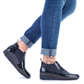 Botas Rieker W R474 de piel de serpiente negra 18