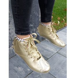 Zapatillas Reebok Betwixt Mid W V55618 dorado 24