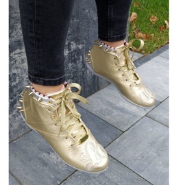 Zapatillas Reebok Betwixt Mid W V55618 dorado 25