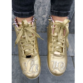 Zapatillas Reebok Betwixt Mid W V55618 dorado 26