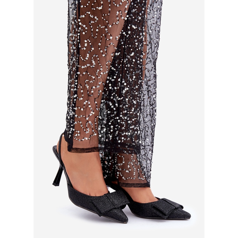 Tacones altos negros brillantes con lazo 1