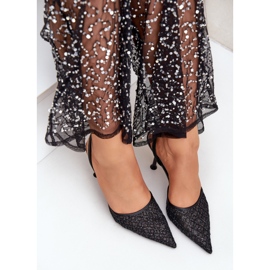 Tacones altos con tacón abierto decorado con purpurina negra. negro 7