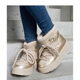 Botas de nieve con plataforma beige aisladas con pelo Sapphi - Solea 1 Botas de nieve con plataforma beige aisladas con pelo Sapphi - Solea 1