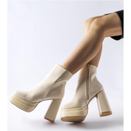 Botines beige con tacón y plataforma con cremallera 1