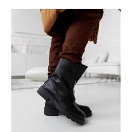 Botines aislantes negros con cremallera. 4