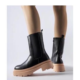 Botines negros con suela rosa claro. 2 Botines negros con suela rosa claro. 2