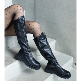 Botas negras de ecopiel con tacón plano decoradas con cremallera. negro 4