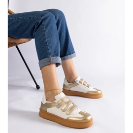 Zapatillas doradas con cierre de velcro. dorado 1
