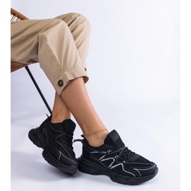 Zapatillas negras para mujeres en una suela masiva negro 2
