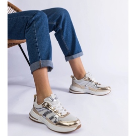 Zapatillas deportivas de tela con inserciones doradas. dorado 1 Zapatillas deportivas de tela con inserciones doradas. dorado 1