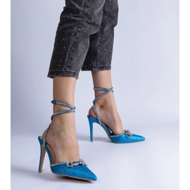 Tacones azules con purpurina, lazo y circonitas. 2