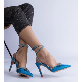 Tacones azules con purpurina, lazo y circonitas. 1