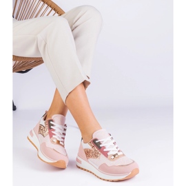 Zapatillas de zapatillas rosadas en la plataforma decorada con brillo rosado 3