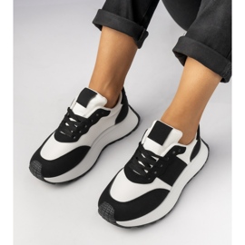 Zapatillas de deporte deportivo en blanco y negro 1 Zapatillas de deporte deportivo en blanco y negro 1