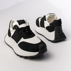 Zapatillas de deporte deportivo en blanco y negro 4