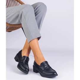 Bombas negras ecológicas en un poste bajo negro 2 Bombas negras ecológicas en un poste bajo negro 2