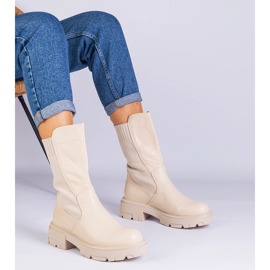 Botas beige con un inserto de material 1