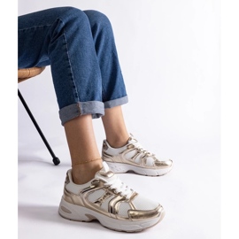 D/CEO Deportivas Ena blancas y doradas. dorado 2