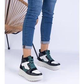 Zapatillas deportivas para mujeres en blanco y negro en la plataforma 1