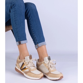 Zapatillas de deporte para mujeres marrones en una cuña oculta marrón 3
