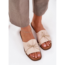 Suelas planas con un arco beige decorativo 6