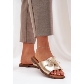 Chanclas de suela plana con un arco de oro decorativo dorado 5