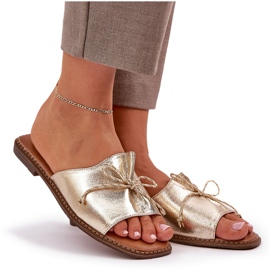 Chanclas de suela plana con un arco de oro decorativo dorado 8
