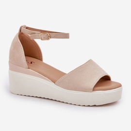Sandalias de luz en la plataforma y delicadas cuñas de color beige brillante 4