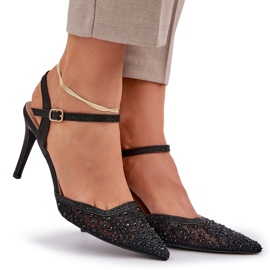 Tacones altos decorados con un tacón negro 9