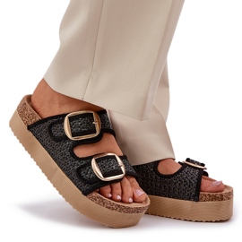 Zapatillas con trenza y hebillas en la plataforma masiva negra negro 8