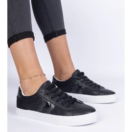 Zapatillas negras con un motivo animal decorado con brillo negro 1