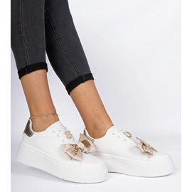 Zapatillas blancas y de oro de las mujeres con arco blanco 2