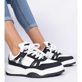 Zapatillas en blanco y negro con cordones gruesos 2