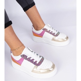 Zapatillas de zapatillas multicolores en una suela gruesa 4
