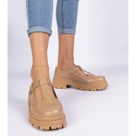 Zapatos marrones en la plataforma ecológica marrón 1