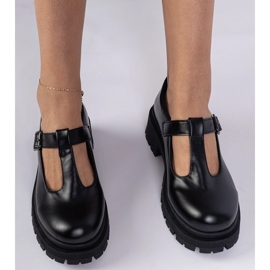 Zapatos negros en la plataforma ecológica 3