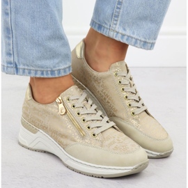 Zapatillas de deporte en una cuña rieker n4316 zlotys dorado 13
