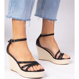 Sandalias negras alojadas en cuña negro 5