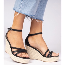 Sandalias negras alojadas en cuña negro 4