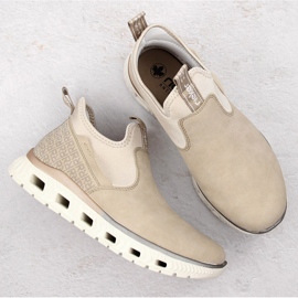Zapatos slip-on beige cómodos y altos para mujer Rieker M6053-62 10