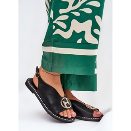 Sandalias planas y elegantes con una decoración negra negro 2