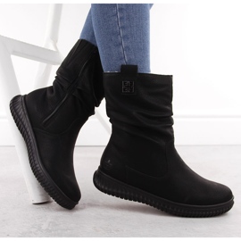 Botas aislantes para mujer con plataforma negra Rieker 74283-00 negro 9
