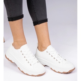 Zapatillas blancas con suela gruesa. blanco 1